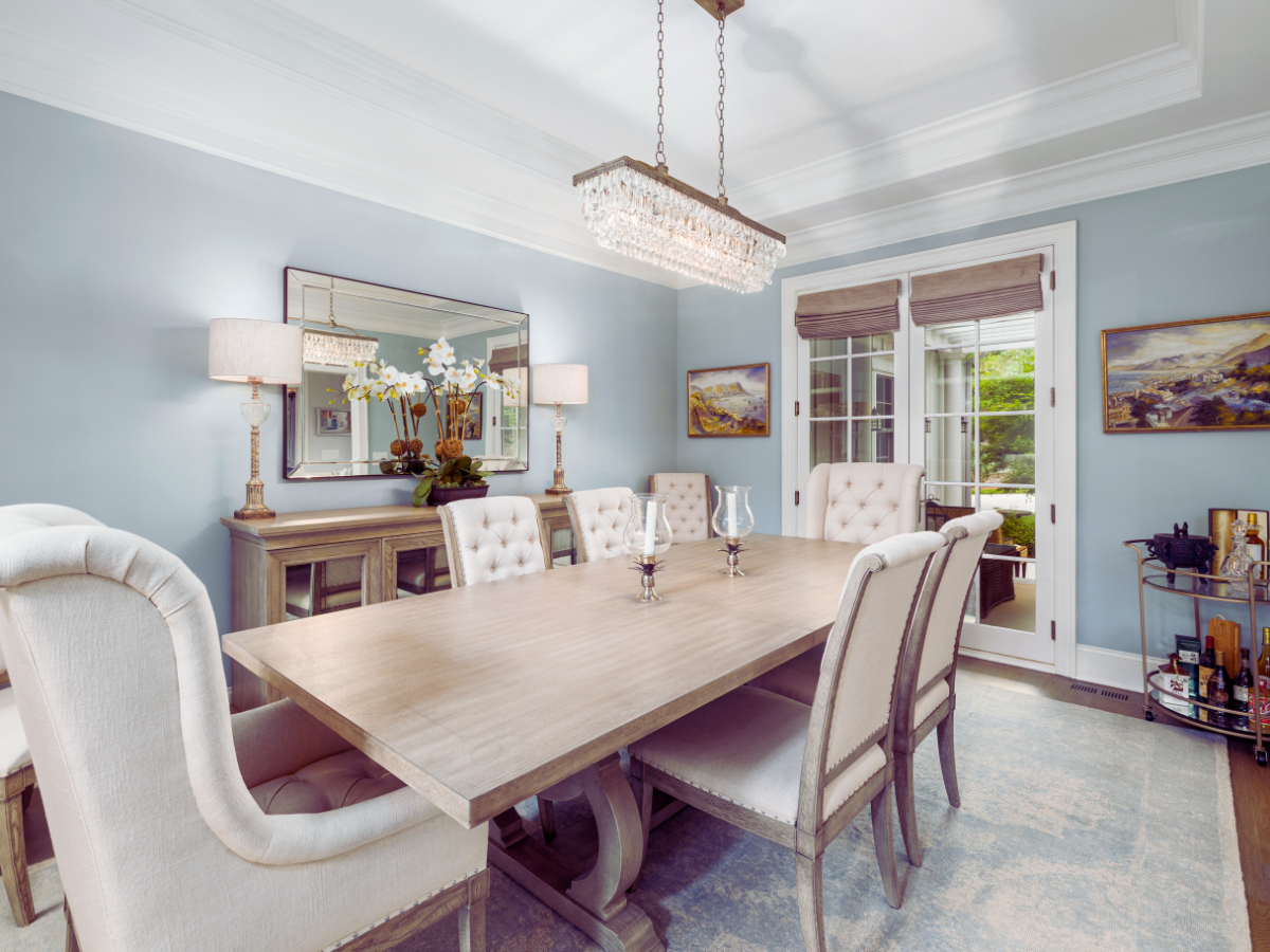 chandelier hanging above dining room table